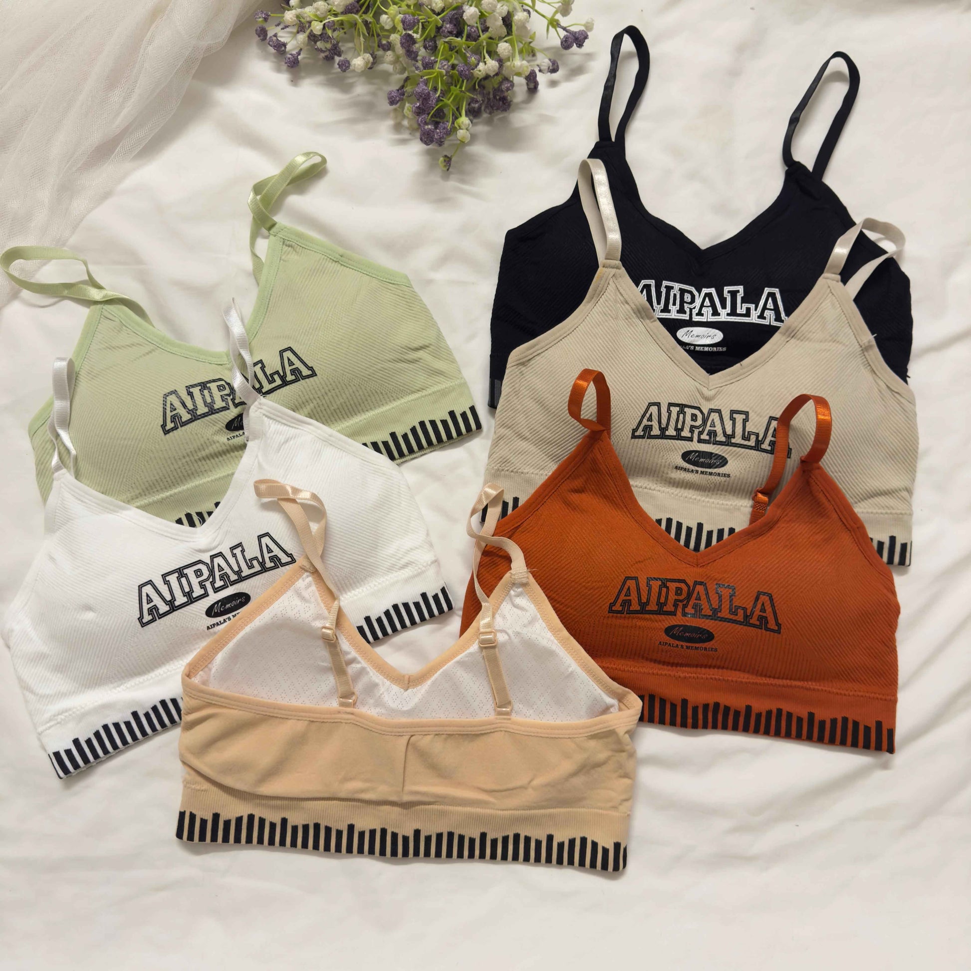 ALPALA written sports bra
